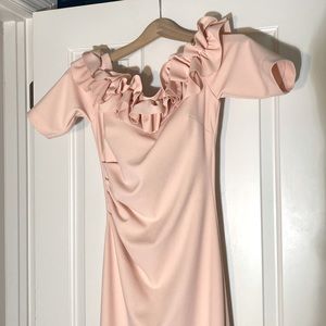 Evening gown was a big hit when I wore it! Like brand new barely worn. Spotless